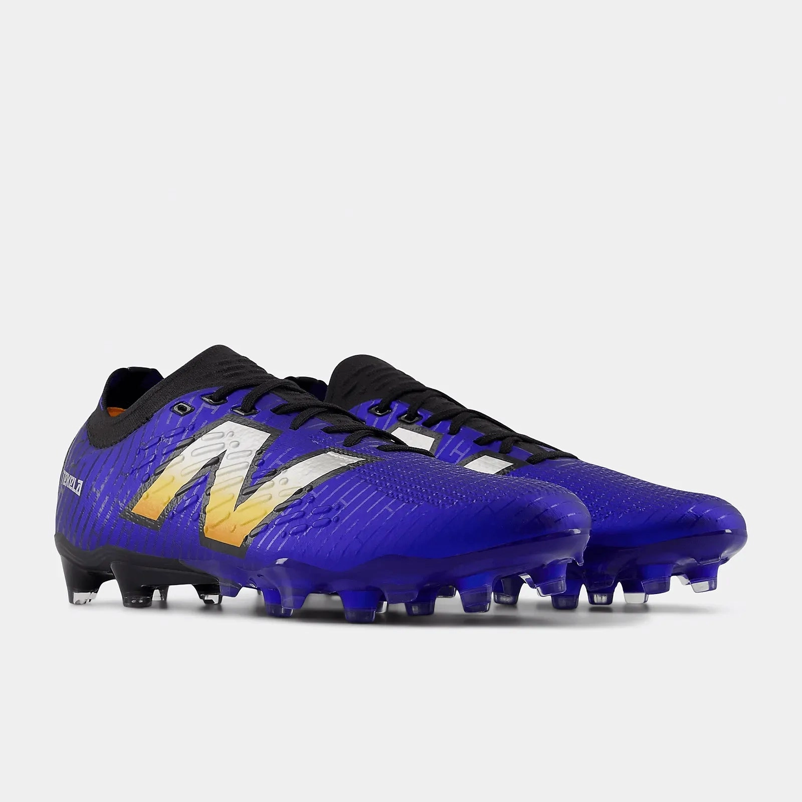 Under Armour Soccer Cleats New Balance Tekela Pro Low Laced FG V4  2E Wide - Power Surge Pack (FA24)